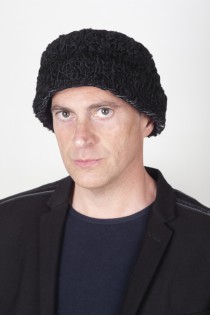 Black Persian Karakul fur hat. Hat with turned-up brim, double-sided fur